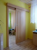 Posuvné dveře a obložkové zárubně (byt Ostrava)